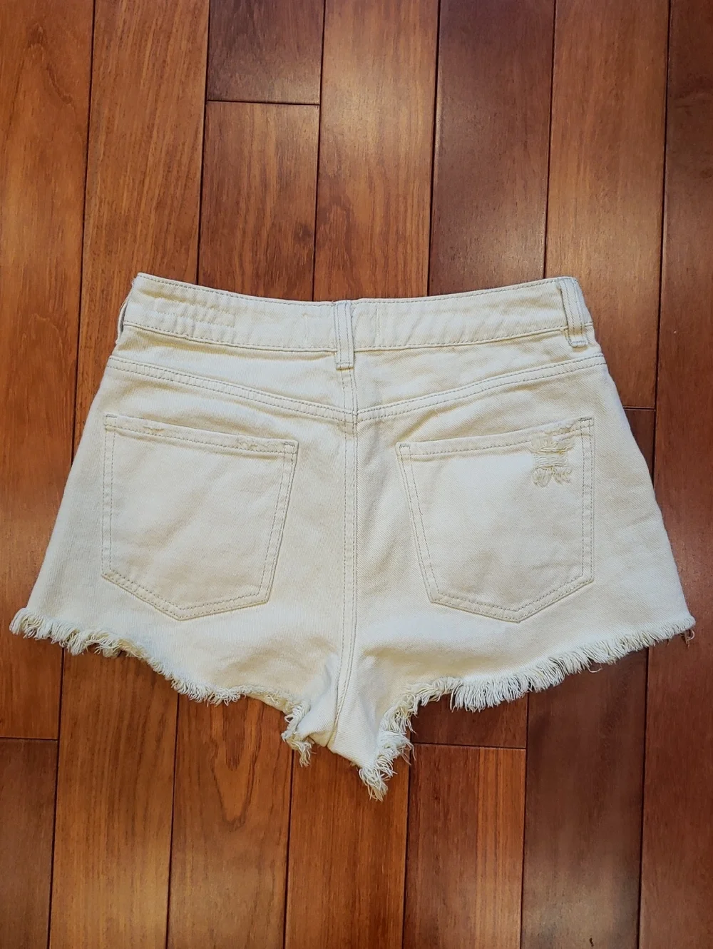 Pac Sun Women's size 26 Mom Short. Light yellow destructed denim jean